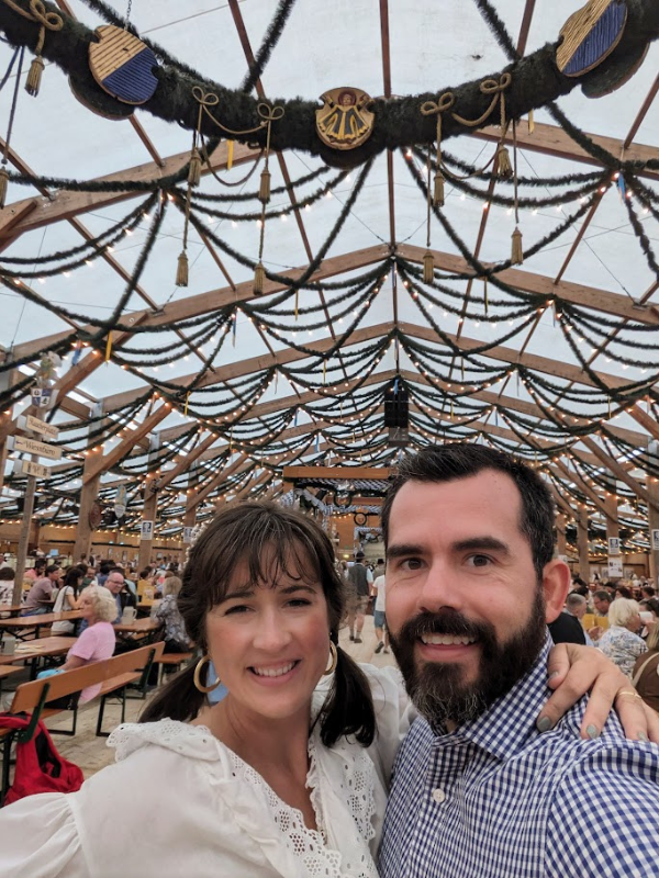 Adoptive couple at an outdoor biergarten