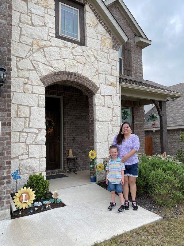 Two-story limestone home of Kristy and David, an Austin, TX couple that wants to adopt a baby