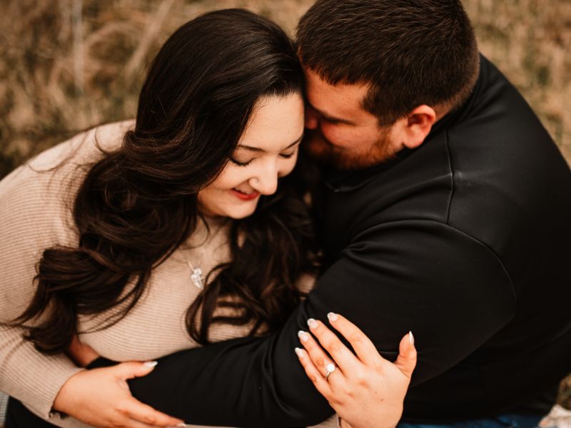 Adoptive parents Brooke and Andrew hugging