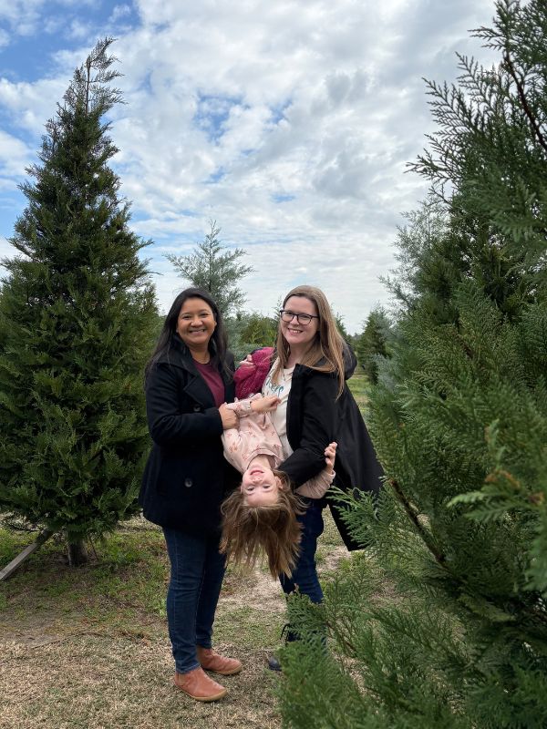 LGBT adoptive family at Christmas tree farm near Houston, TX