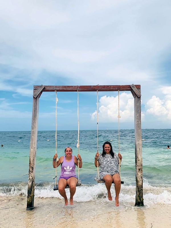 Sam and Cris, hispanic adoptive moms, at the beach