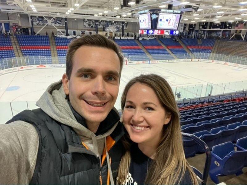 Kelly and Christopher at an ice hockey game