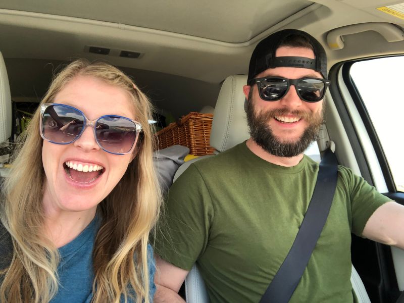 Texas adoptive couple in car on a road trip