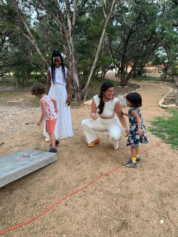 white adoptive mom and black adoptive mom at an Austin, TX park