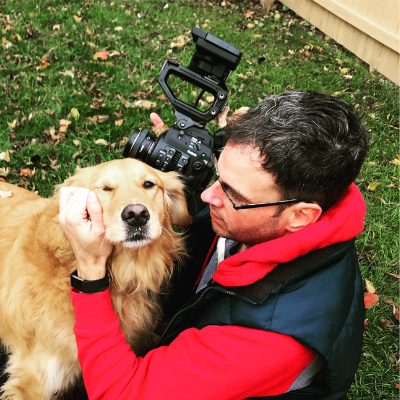 Dave, an Austin parent waiting to adopt a baby, with his camera