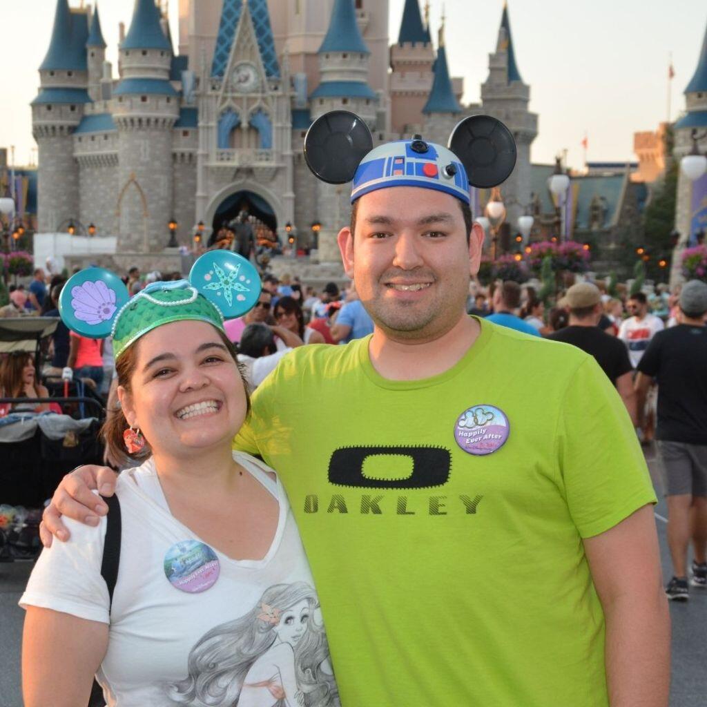 Adoptive family Kristy and David wearing mouse ears at Disneyland